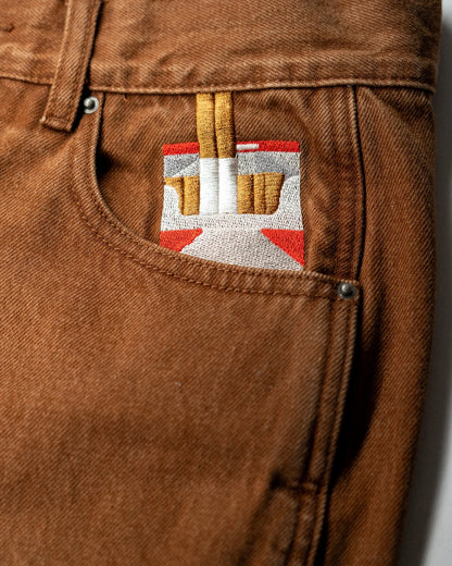 WASHED BROWM JEANS®